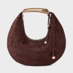 A New Day Metal Handle Crescent Saddle Handbag – Crescent saddle silhouette with a metal top handle.