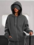 Comfrt Airplane Mode Travel Hoodie – Built-in contoured eye mask and eight pockets, including zip sleeve pockets